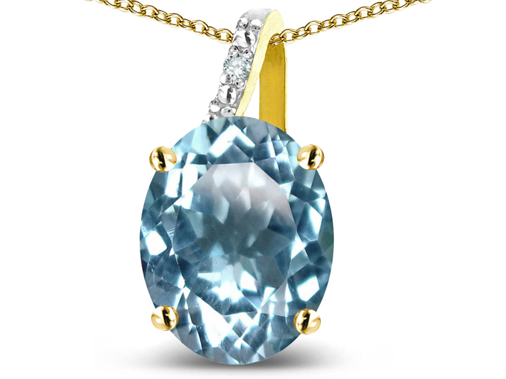 Star K 14k Gold Oval 9x7 Genuine Sky Blue Topaz Journey Pendant Necklace