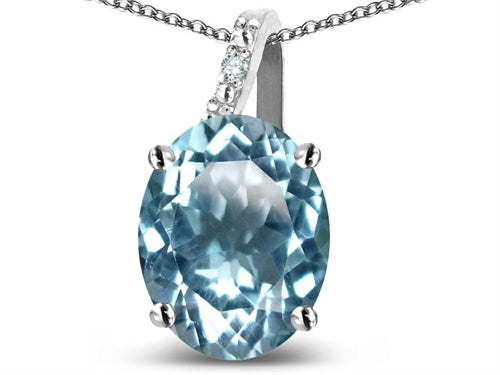 Star K 14k Gold Oval 9x7 Genuine Sky Blue Topaz Journey Pendant Necklace