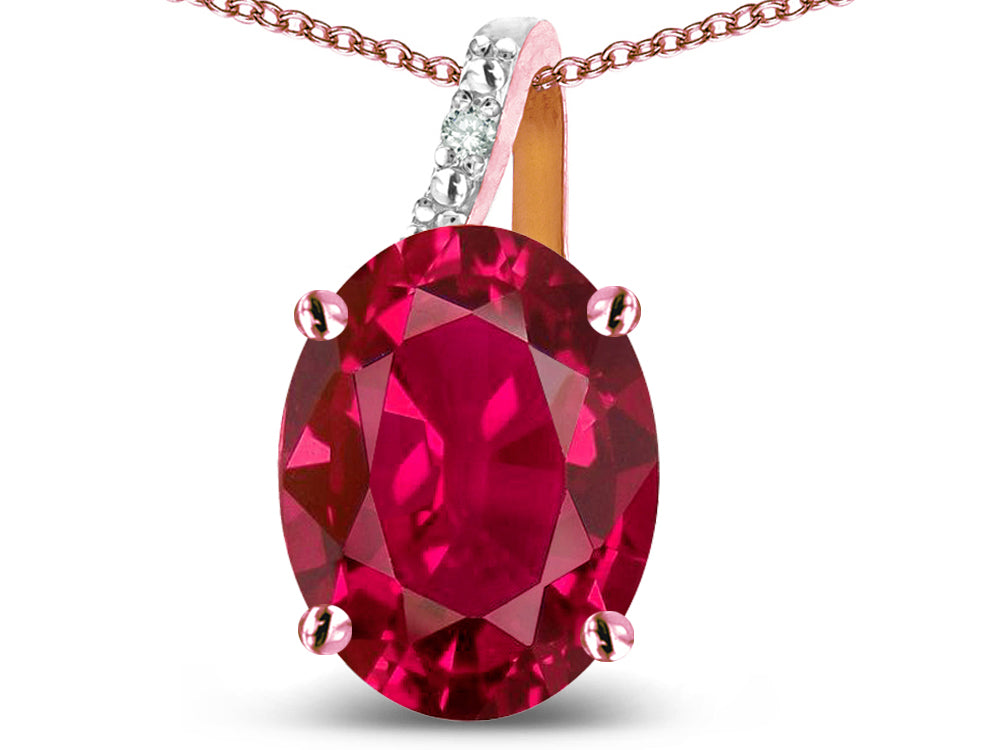 Star K 14k Gold Oval 9x7 Created Ruby Journey Pendant Necklace