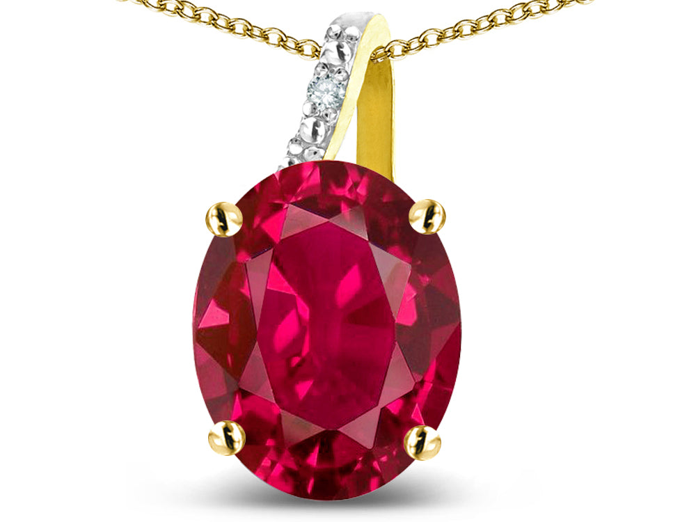 Star K 14k Gold Oval 9x7 Created Ruby Journey Pendant Necklace