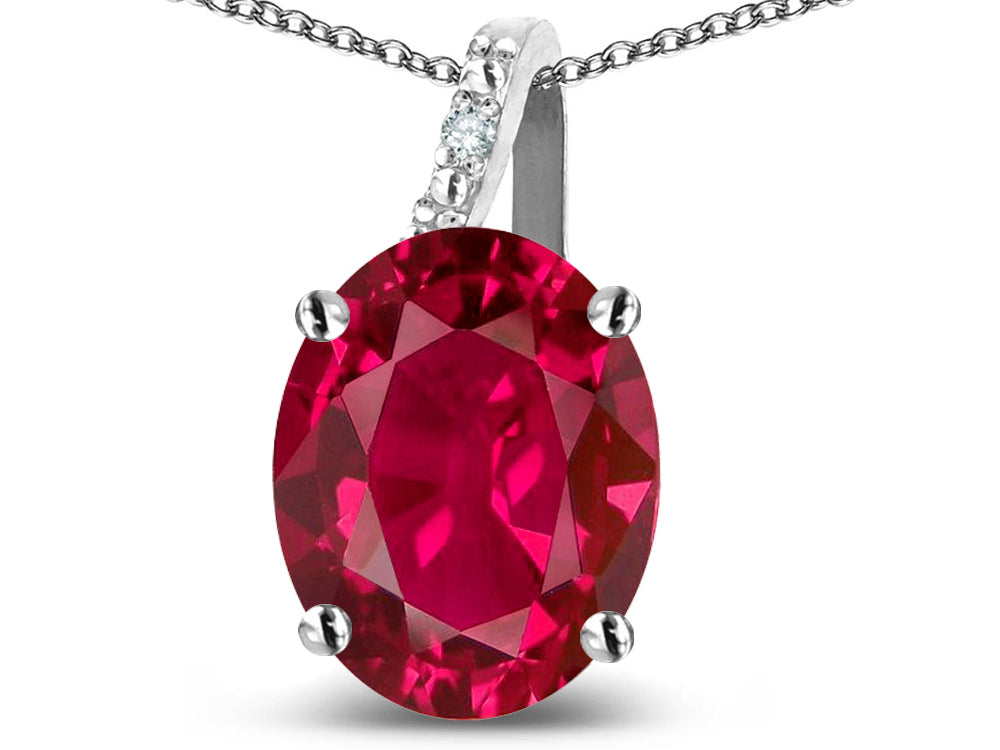 Star K 14k Gold Oval 9x7 Created Ruby Journey Pendant Necklace