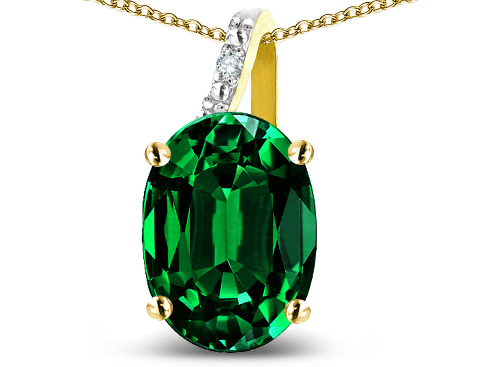 Star K 14k Gold Oval 9x7 Simulated Emerald Journey Pendant Necklace