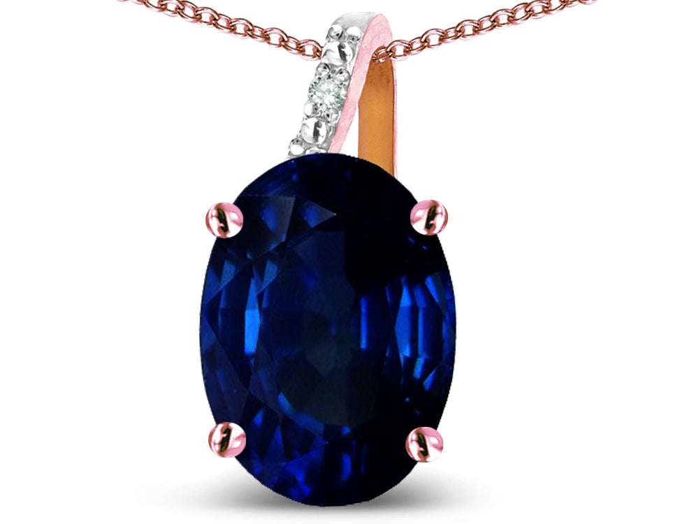 Star K 10k Gold Oval 9x7 Created Sapphire Journey Pendant Necklace