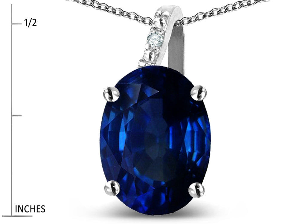 Star K 10k Gold Oval 9x7 Created Sapphire Journey Pendant Necklace