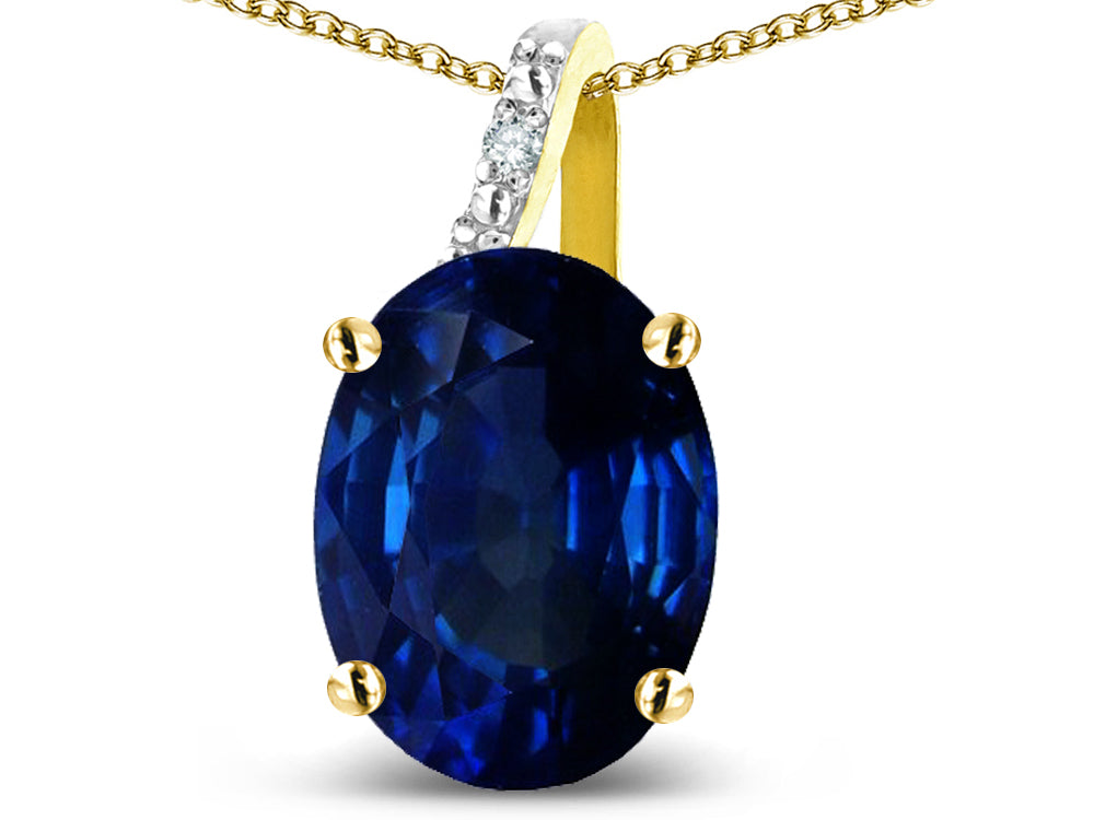 Star K 10k Gold Oval 9x7 Created Sapphire Journey Pendant Necklace