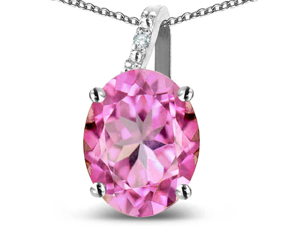 Star K 10k Gold Oval 9x7 Created Pink Sapphire Journey Pendant Necklace