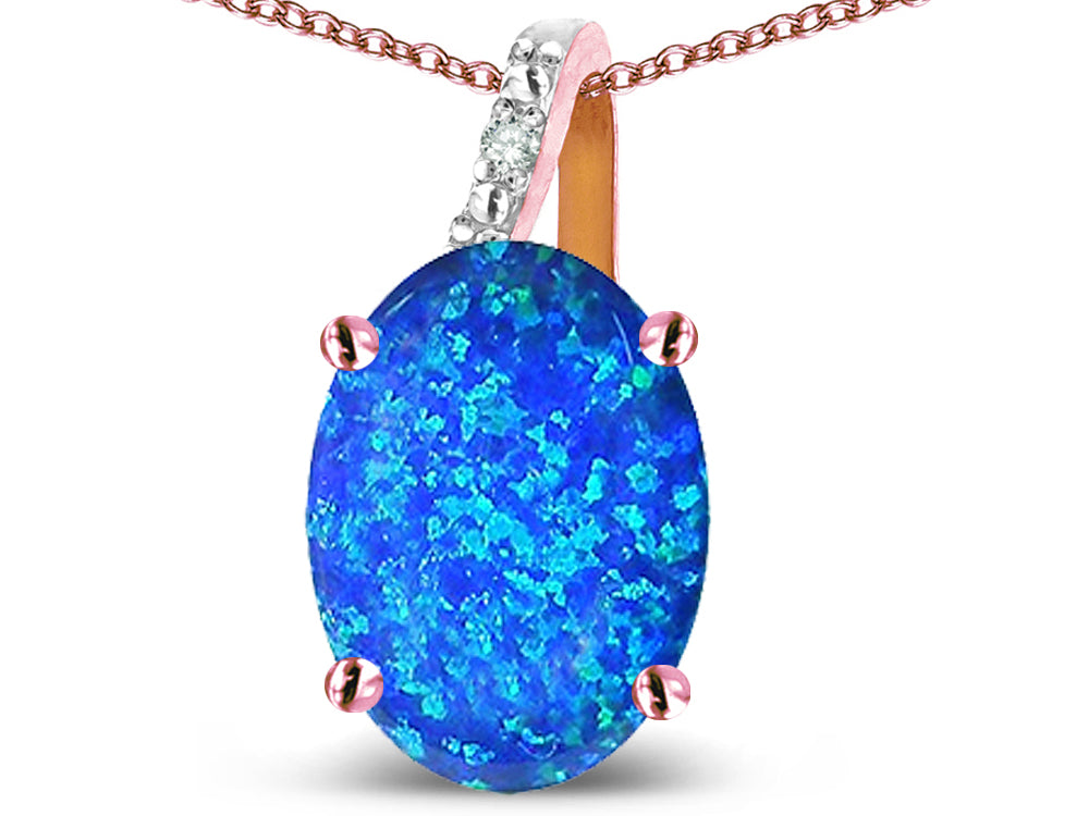 Star K 10k Gold Oval 9x7 Created Blue Opal Journey Pendant Necklace