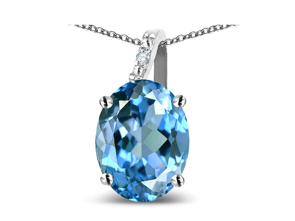 Star K Oval 8x6 Genuine Blue Topaz Journey Pendant Necklace