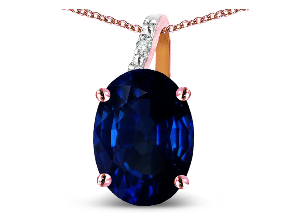 Star K Oval 8x6 Created Sapphire Journey Pendant Necklace