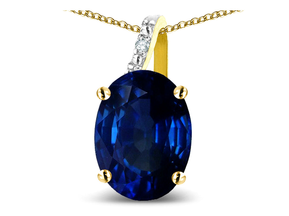 Star K Oval 8x6 Created Sapphire Journey Pendant Necklace
