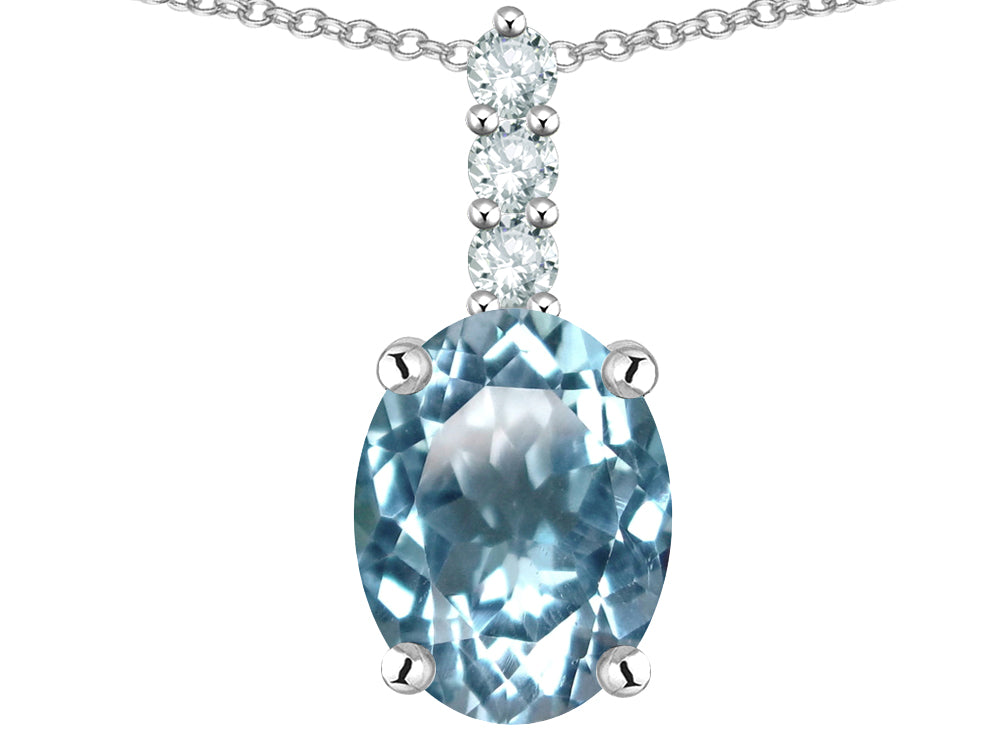 Star K  8x6mm Oval Genuine Sky Blue Topaz Three Stone Pendant Necklace