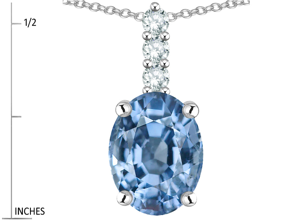 Star K  8x6mm Oval Simulated Aquamarine Three Stone Pendant Necklace