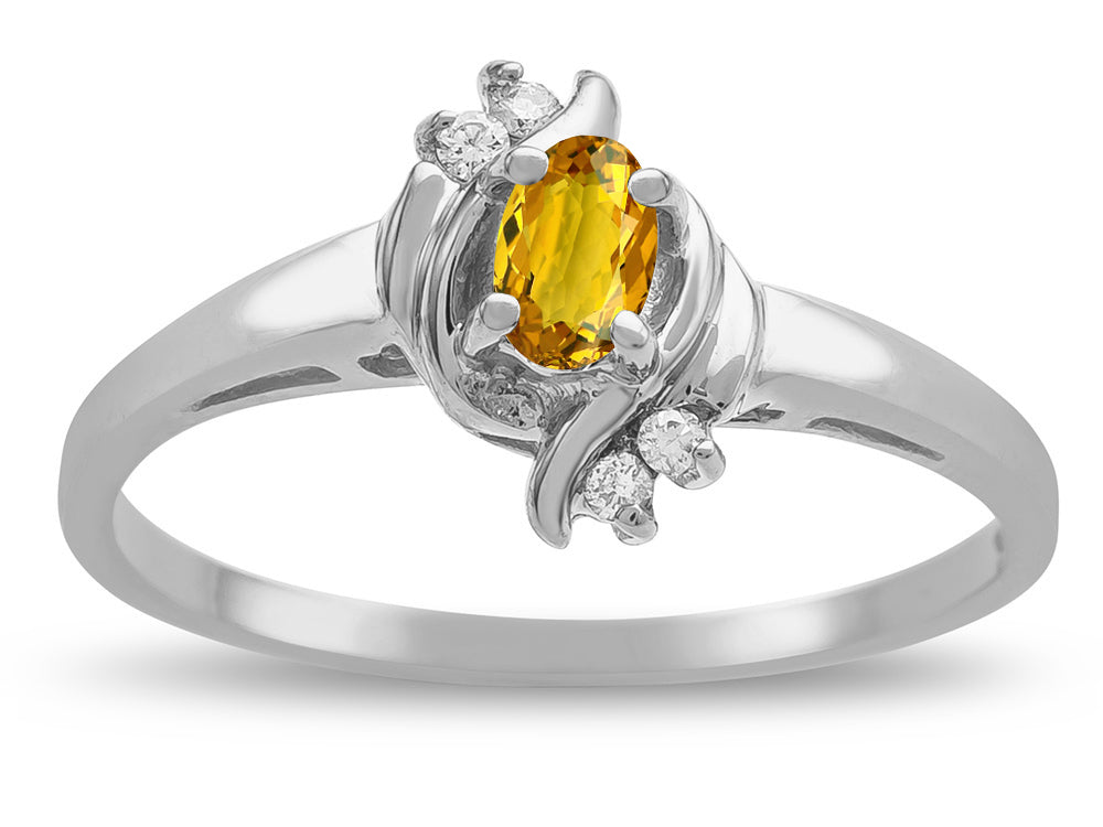 Star K  Small Oval 5x3mm Genuine Citrine Bypass Ring