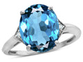 Star K  Large Oval 12x10 Blue Topaz 3 Stone Trillion Setting Ring