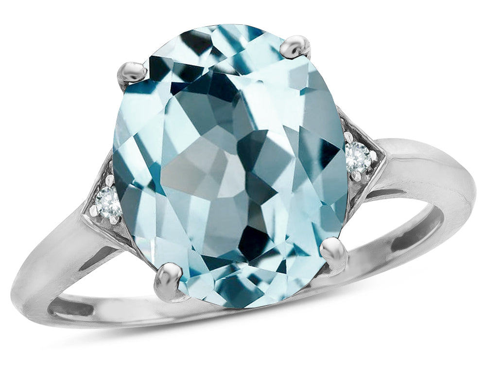 Star K  Large Oval 12x10 Sky Blue Topaz 3 Stone Trillion Setting Ring
