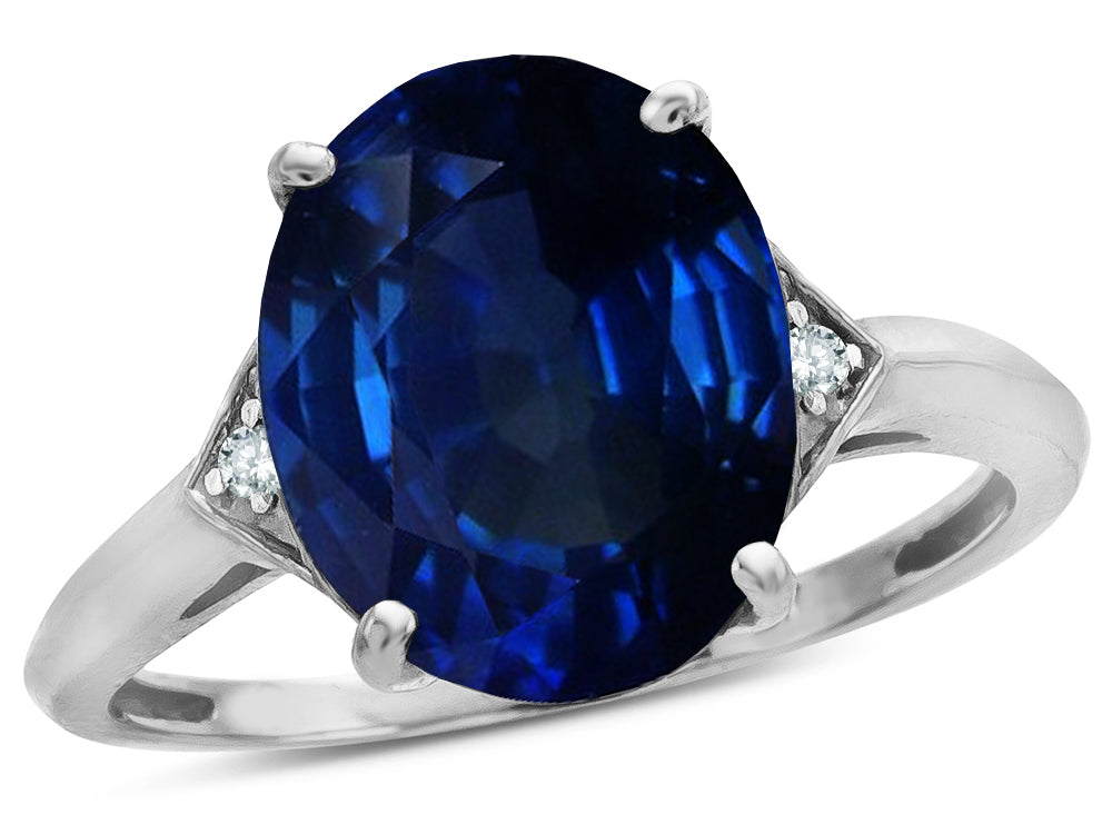 Star K  Large Oval 12x10 Created Sapphire 3 Stone Trillion Setting Ring
