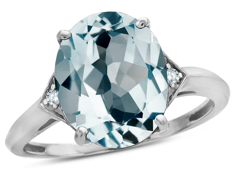 Star K  Large Oval 12x10 Simulated Aquamarine 3 Stone Trillion Setting Ring