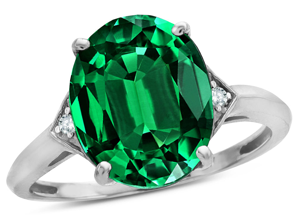 Star K  Large Oval 12x10 Simulated Emerald 3 Stone Trillion Setting Ring