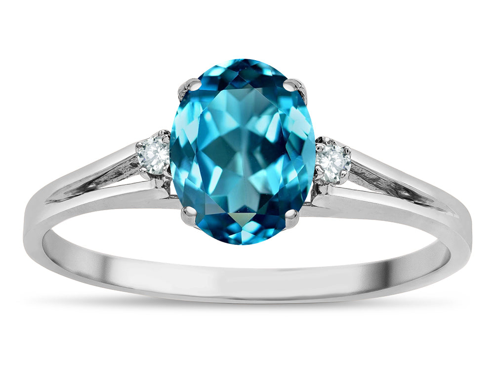 Star K  Oval 8x6 Genuine Blue Topaz Split Shank Three Stone Engagement Promise Ring