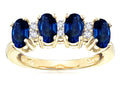 Star K Oval 5x3 Created Sapphire 4 Four Stone Band Ring