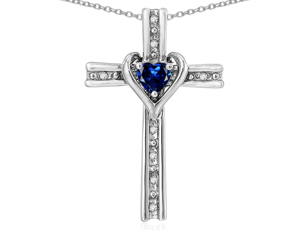 Star K 10k Gold Two Tone Love Cross with Created Sapphire Heart Stone Pendant Necklace