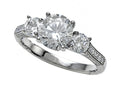 Zoe R Micro Pave Hand Set Cubic Zirconia (CZ) 3 Stone Engagement Ring with 7mm center.