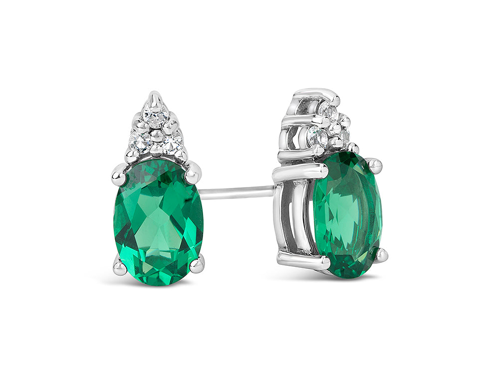 FJC Finejewelers 10k White Gold 7x5mm Oval Created Emerald with White Topaz Earrings