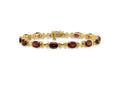 FJC Finejewelers 14 kt Yellow Gold 7x Oval Garnet Bracelet 7 Inches x 5 mm