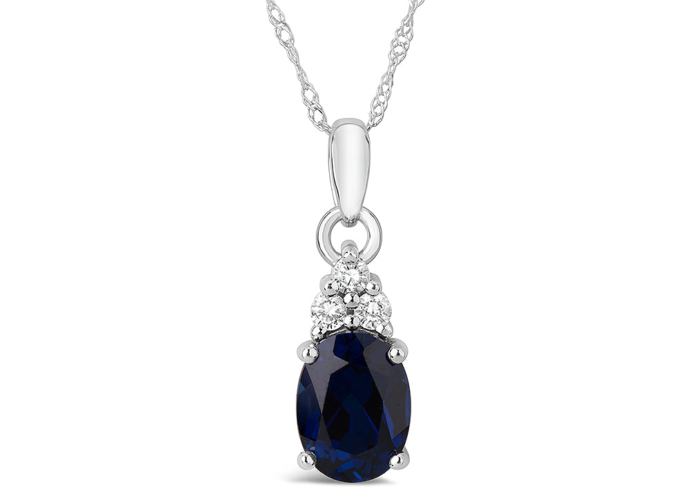 FJC Finejewelers 10k White Gold 8x6mm Oval Created Blue Sapphire Pendant Necklace