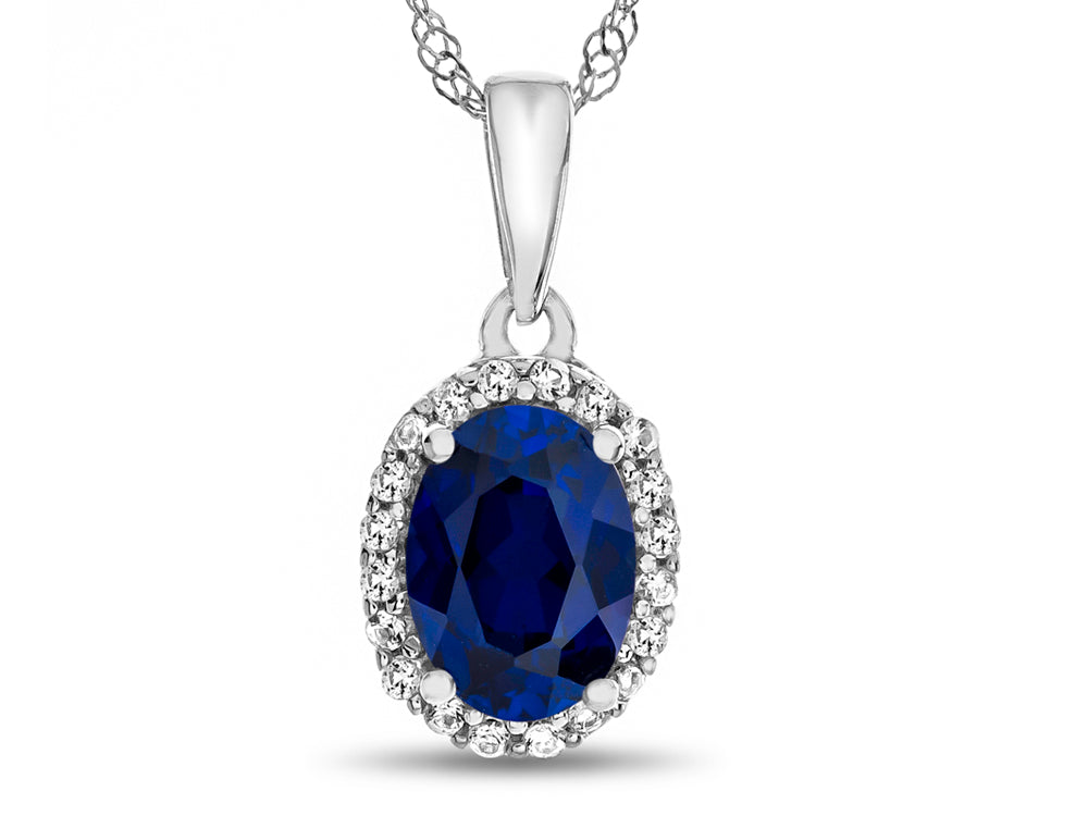 FJC Finejewelers 10k White Gold 7x5mm Oval Created Blue Sapphire White Topaz Accents Halo Pendant Necklace