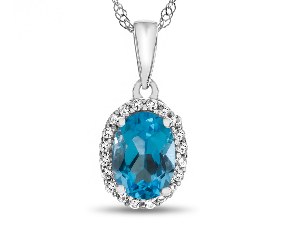 FJC Finejewelers 10k White Gold 7x5mm Oval Swiss Blue Topaz with White Topaz accent stones Halo Pendant Necklace