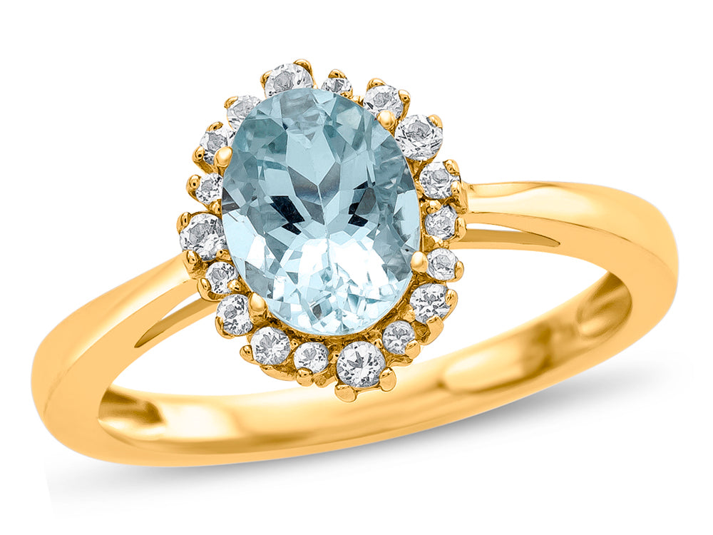 FJC Finejewelers 10k Yellow Gold 8x6mm Oval Aquamarine with White Topaz accent stones Halo Ring