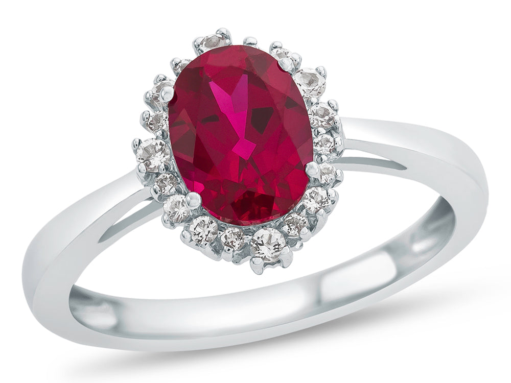 FJC Finejewelers 10k White Gold 8x6mm Oval Created Ruby with White Topaz accent stones Halo Ring