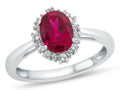 FJC Finejewelers 10k White Gold 8x6mm Oval Created Ruby with White Topaz accent stones Halo Ring