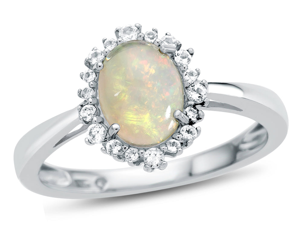 FJC Finejewelers 10k White Gold 8x6mm Oval Opal with White Topaz accent stones Halo Ring