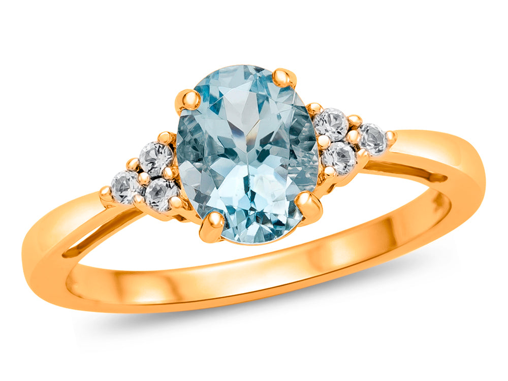 FJC Finejewelers 10k Yellow Gold 8x6mm Oval Aquamarine and White Topaz Ring