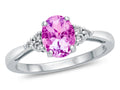 FJC Finejewelers 10k White Gold 8x6mm Oval Created Pink Sapphire and White Topaz Ring