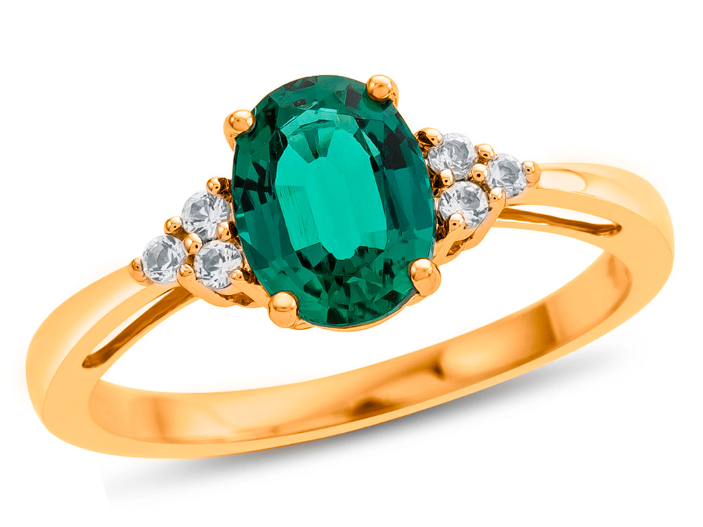 FJC Finejewelers 10k Yellow Gold 8x6mm Oval Created Emerald and White Topaz Ring