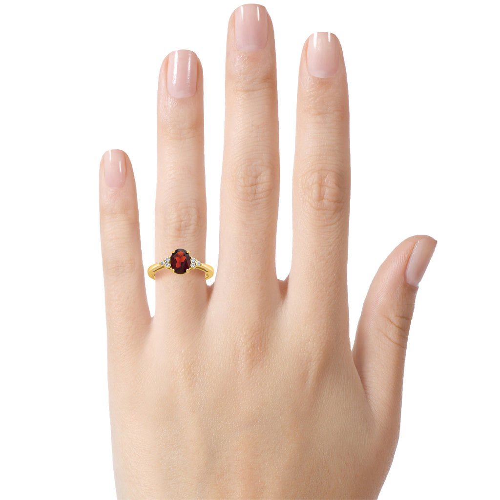 FJC Finejewelers 10k Yellow Gold 8x6mm Oval Garnet and White Topaz Ring