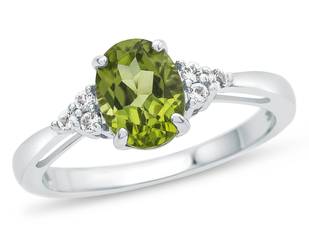 FJC Finejewelers 10k White Gold 8x6mm Oval Peridot and White Topaz Ring