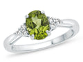 FJC Finejewelers 10k White Gold 8x6mm Oval Peridot and White Topaz Ring