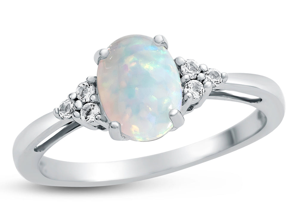 FJC Finejewelers 10k White Gold 8x6mm Oval Created Opal and White Topaz Ring