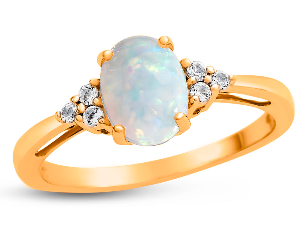 FJC Finejewelers 10k Yellow Gold 8x6mm Oval Created Opal and White Topaz Ring