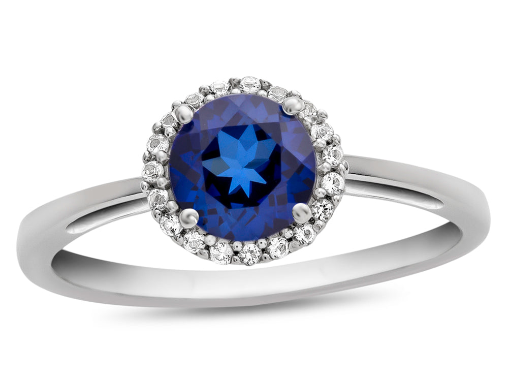 FJC Finejewelers 10k White Gold 6mm Round Created Blue Sapphire with White Topaz accent stones Halo Ring