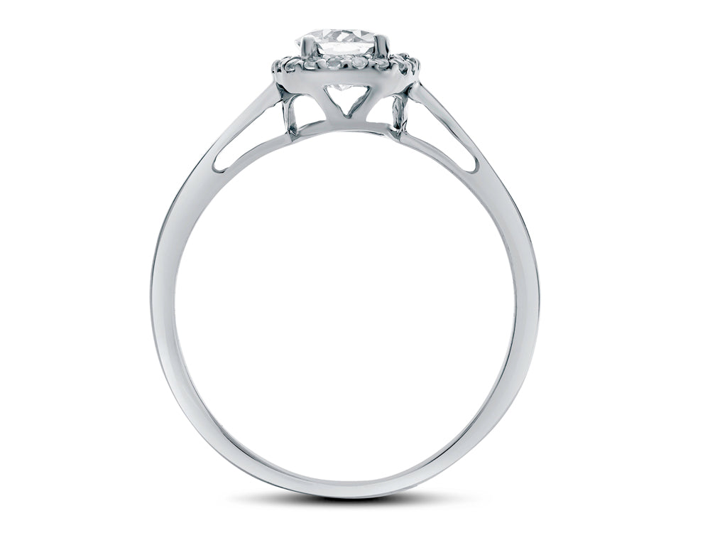 FJC Finejewelers 10k White Gold 7x5mm Oval Created Blue Sapphire with White Topaz accent stones Halo Ring