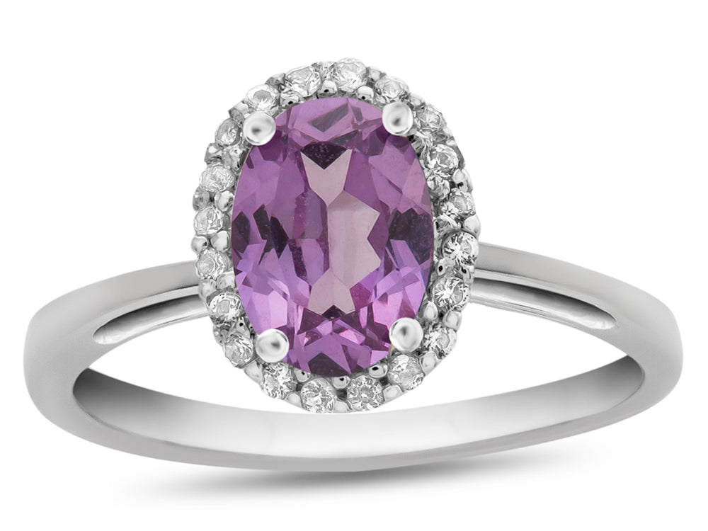 FJC Finejewelers 10k White Gold 7x5mm Oval Simulated Alexandrite with White Topaz accent stones Halo Ring