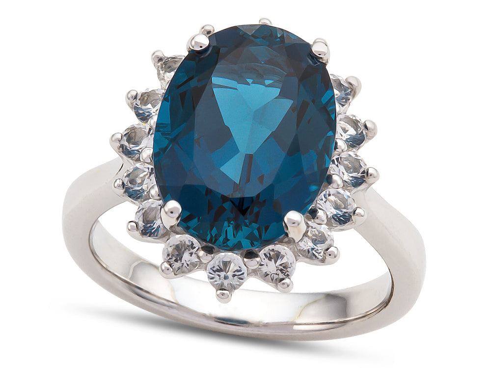 FJC Finejewelers 14x10mm Oval London Blue Topaz and White Topaz Halo Ring